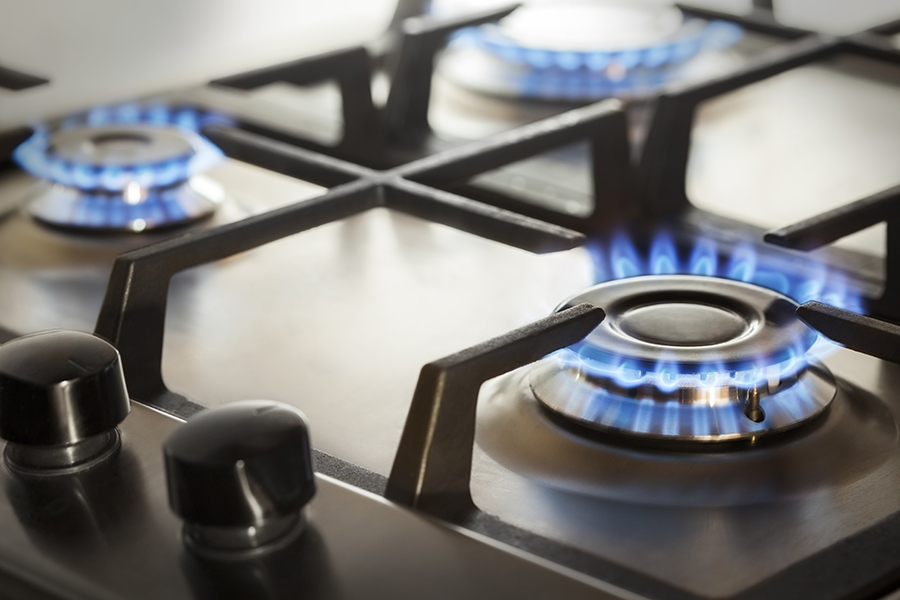 kitchen gas cooker with burning fire propane gas